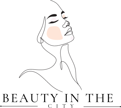 Logo van Beauty In The City: een getekend gezicht in één lijn boven de naam